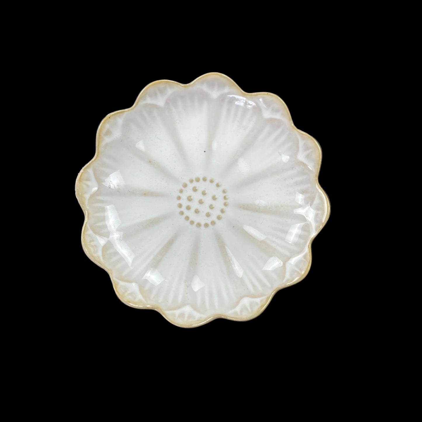 white ceramic flower-shaped dish stands with gold bases