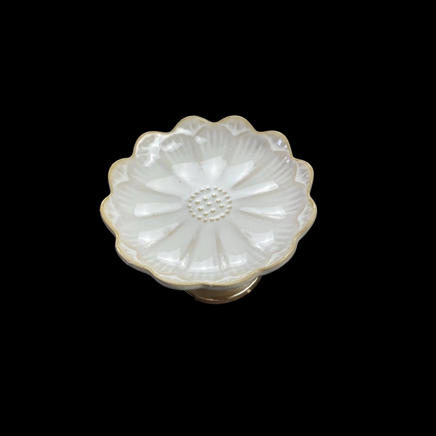 white ceramic flower-shaped dish stands with gold bases